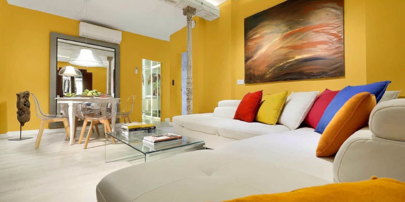Mustard #C99A2E in a bright living room