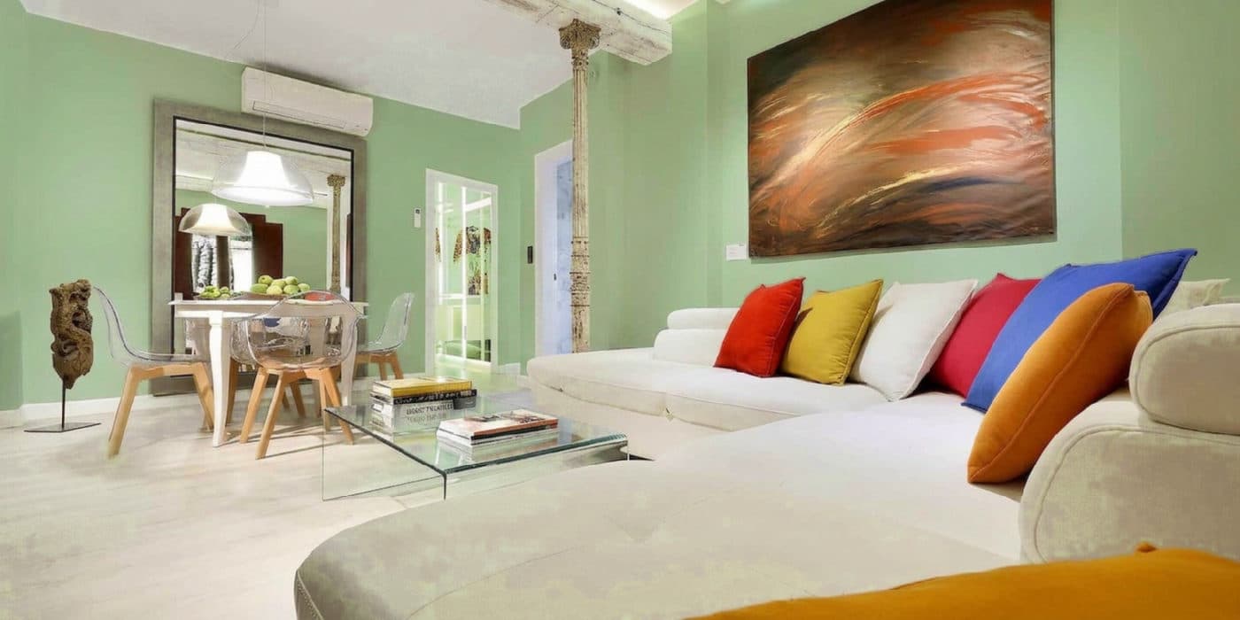 Sage Green #9CAF88 in a bright living room
